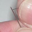 Beading needle tips for prick and stitch card making